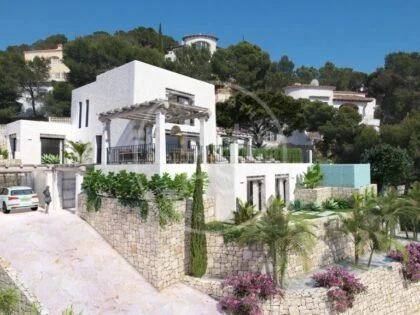 Encantadora villa de estilo ibicenco con impresionantes vistas panorámicas en Moraira