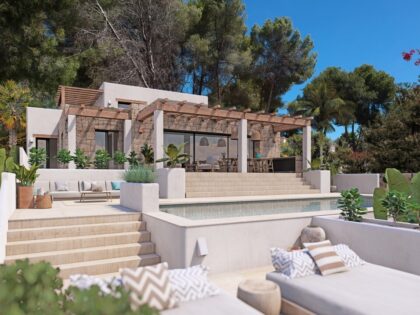 Villa de lujo de estilo ibicenco con vistas panorámicas al mar y a la montaña en Moraira